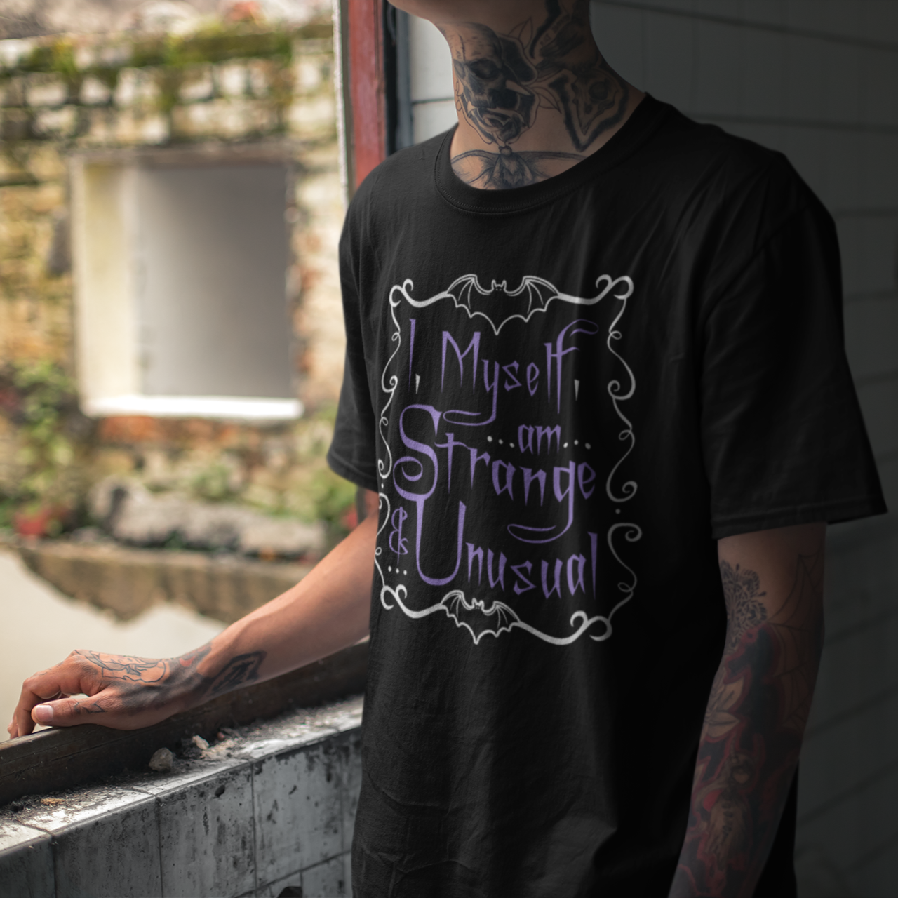 Purple Strange And Unusual Unisex Tee